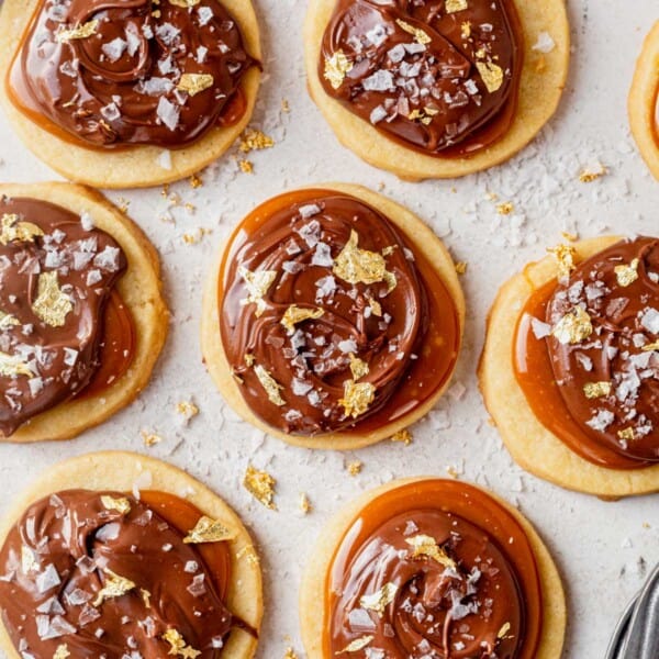 millionaire shortbread cookies decorated with gold leaf and sea salt.