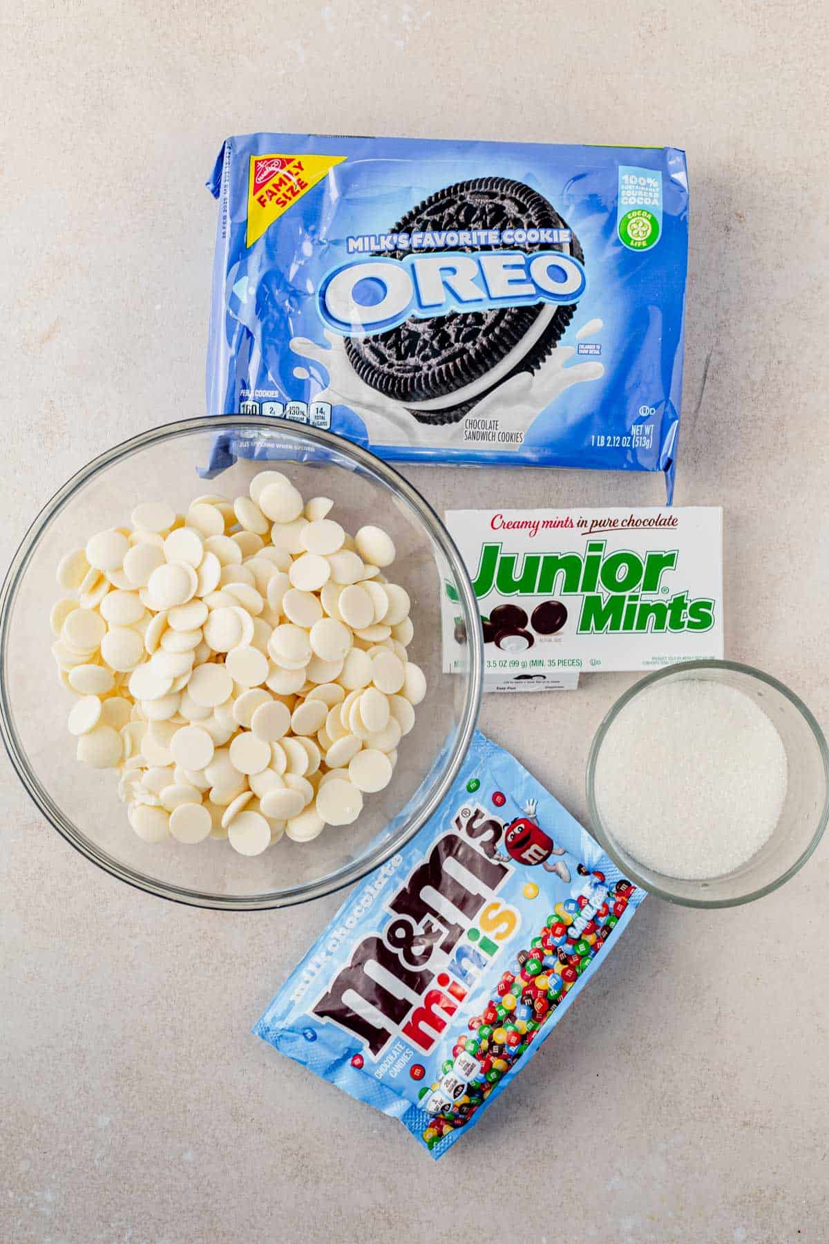 ingredients for polar bear paw oreo cookies on a counter.