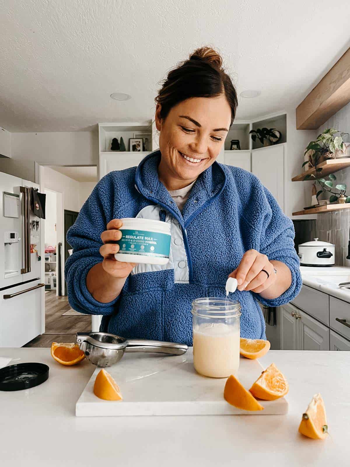 putting inositol powder into an adrenal cocktail.