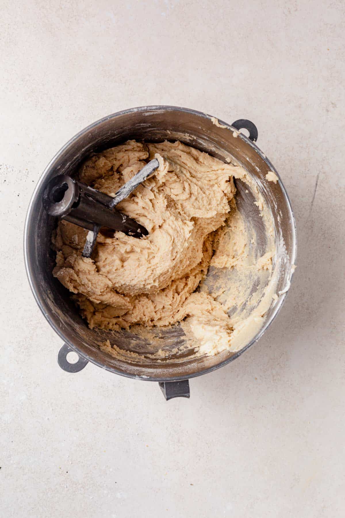 coffee cake cookie dough mixed in a stand mixer.