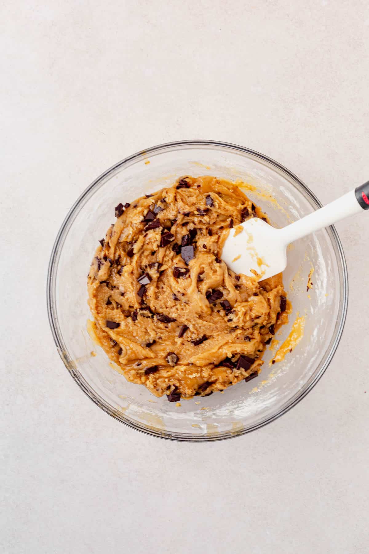 brown butter chocolate chip cookie dough after chilling in a mixing bowl.