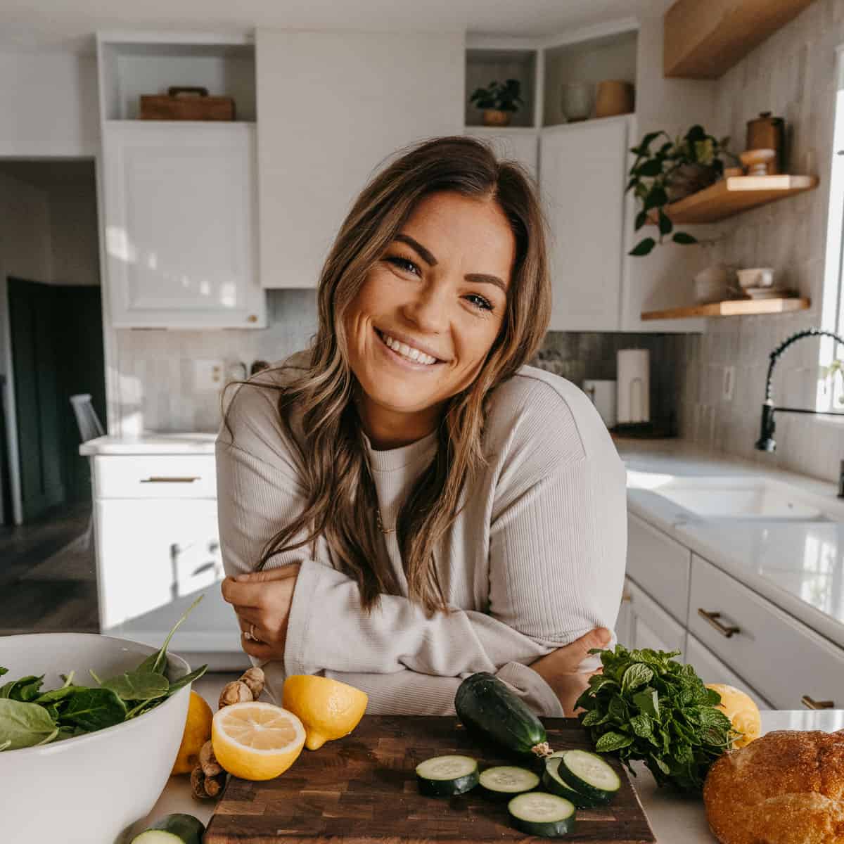 headshot of molly thompson in her kitchen.