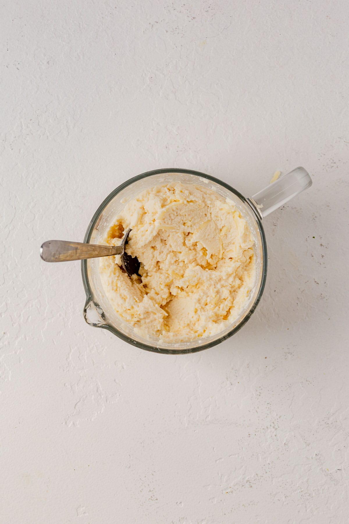 ricotta, mozzarella cheese, and parmesan cheese mixed in a bowl.