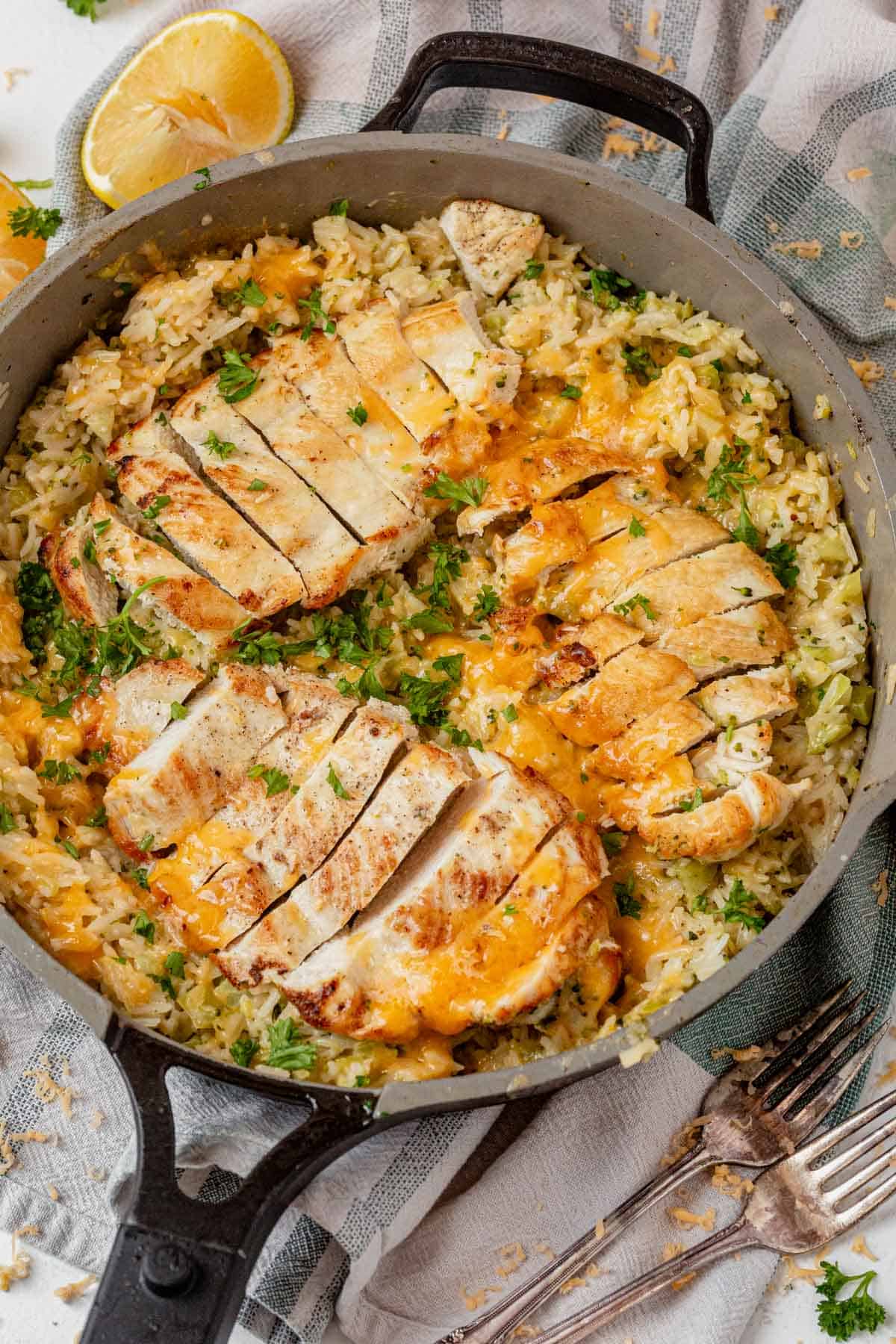 cheesy chicken broccoli and rice in a skillet.