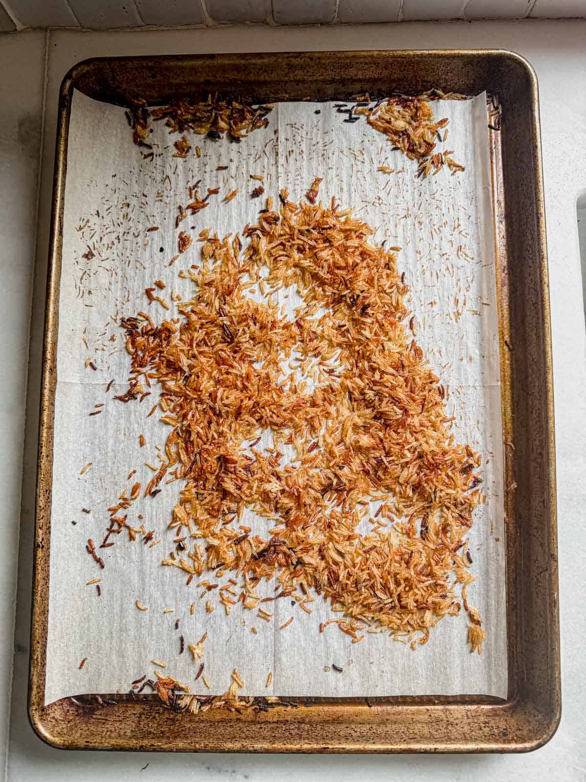 crispy rice on a baking sheet.