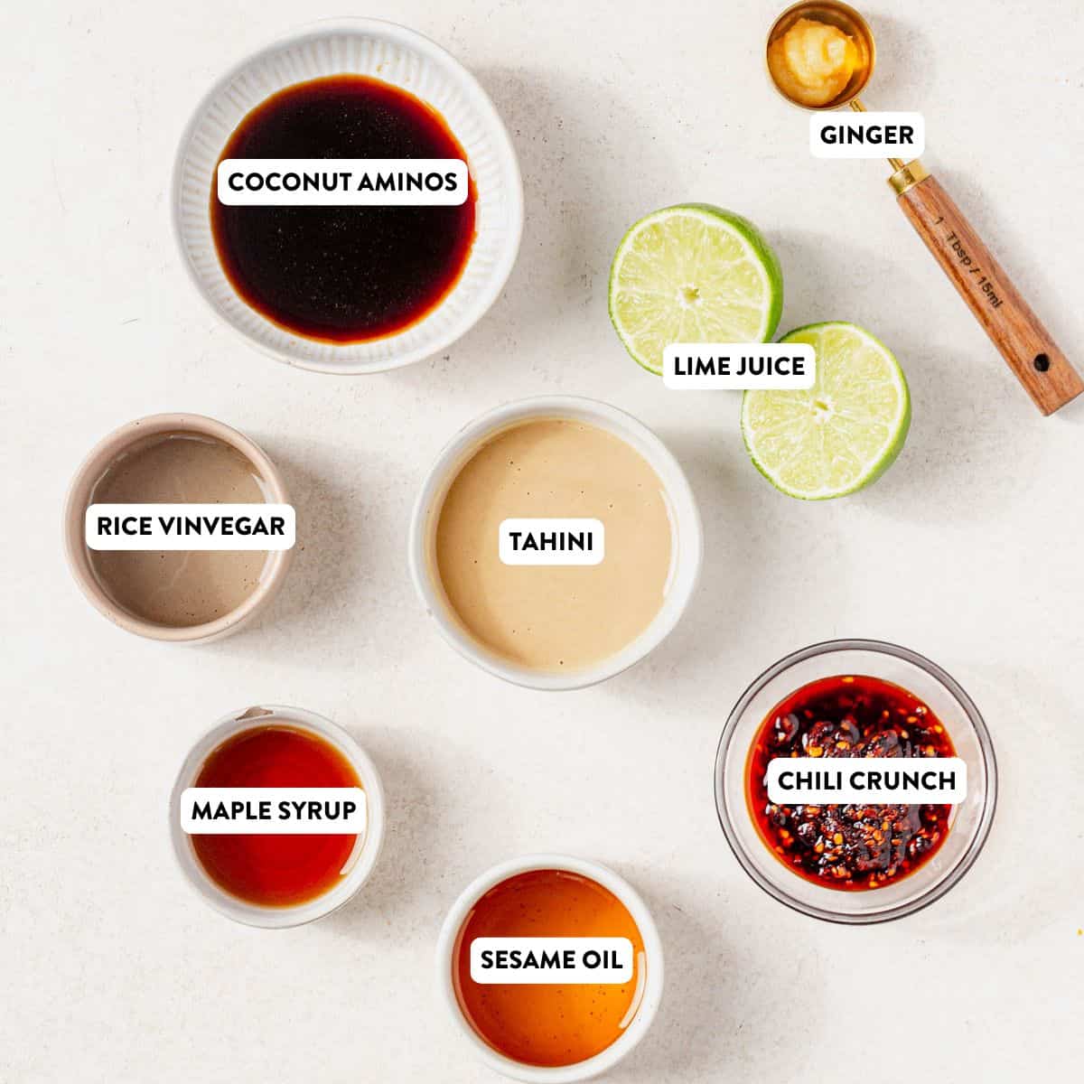 ingredients for maple tahini dressing on a counter.