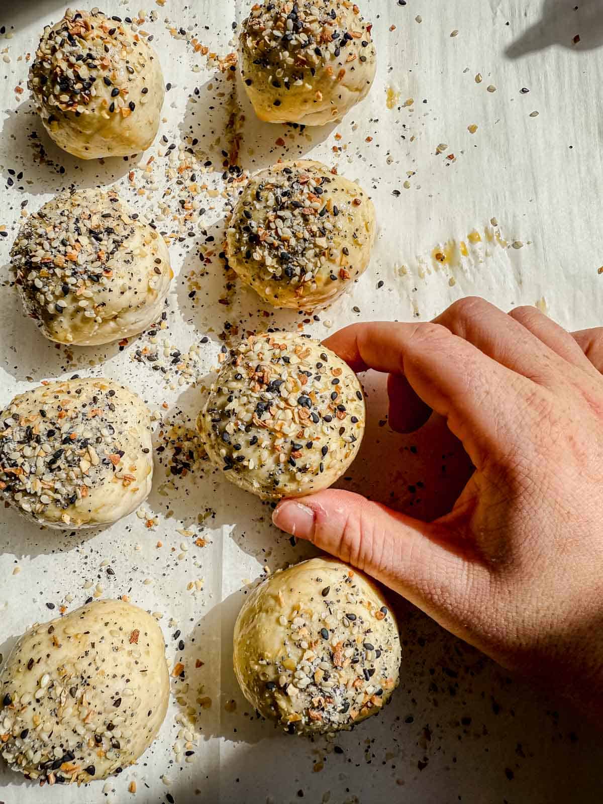 stuffed bagel bites covered in everything bagel seasoning.