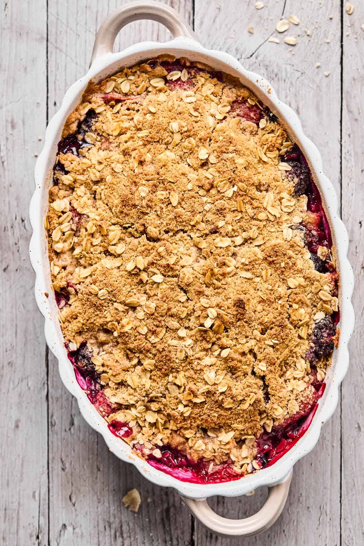 baked gluten free berry crisp in a baking dish