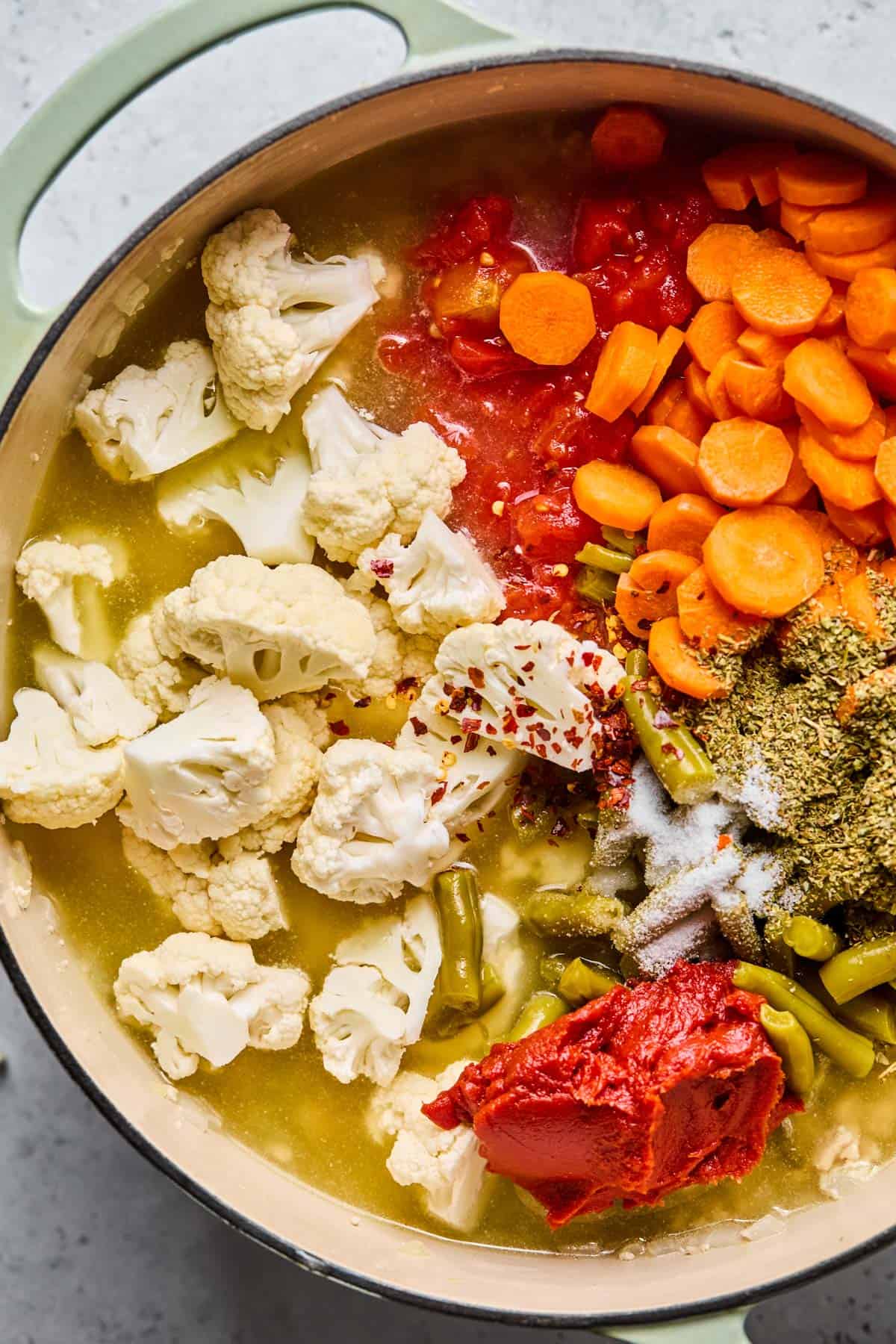 stock and veggies added to pot of low carb turkey soup