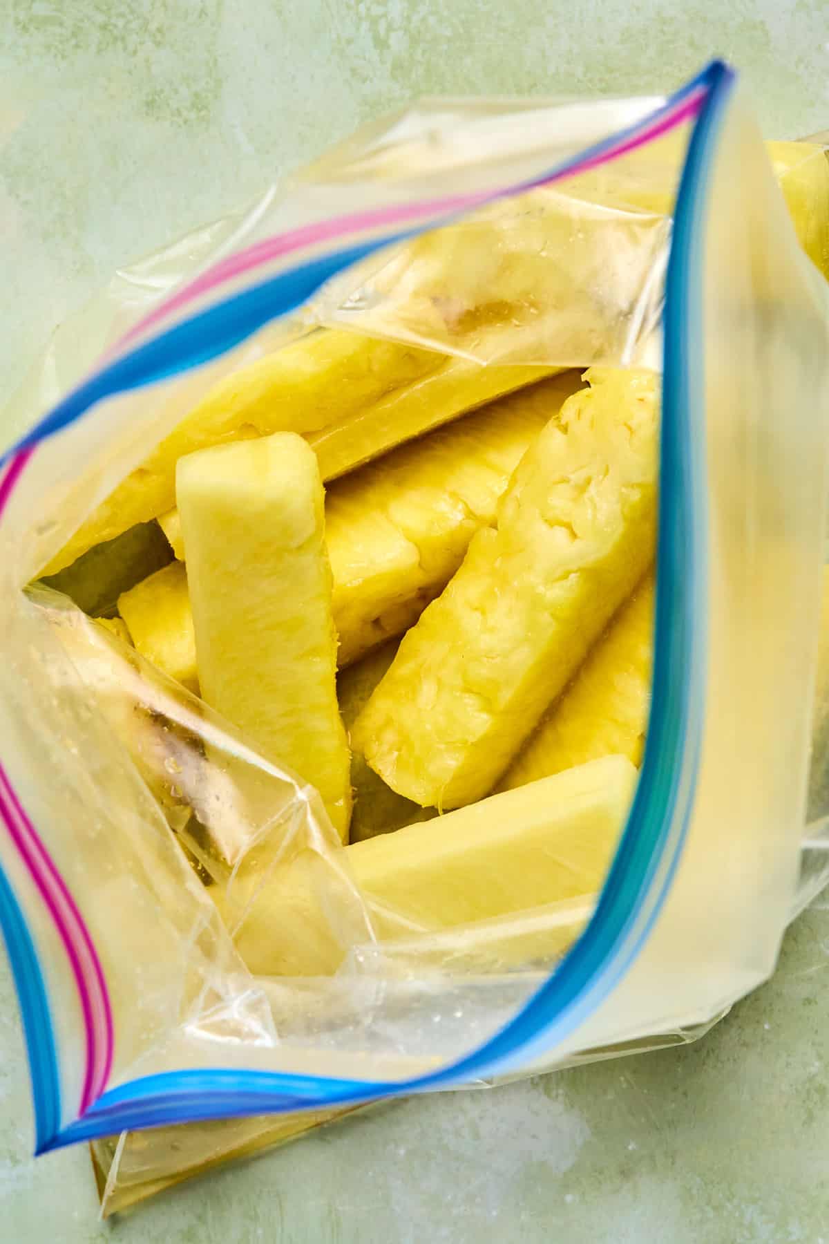 pineapple slices in a ziploc bag