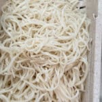 pad thai noodles strained in a collander.