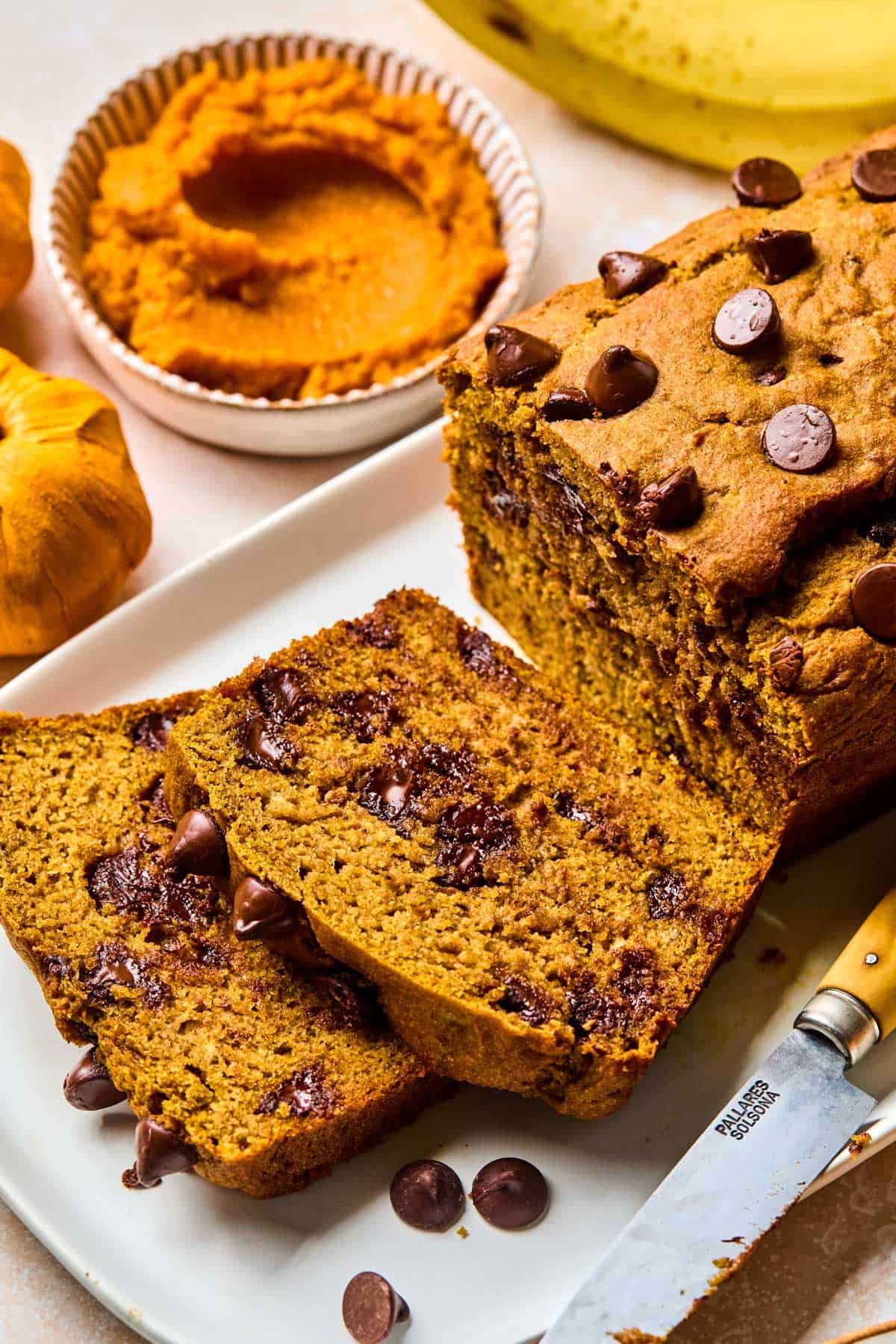 slices of healthy banana pumpkin bread cut off from the loaf