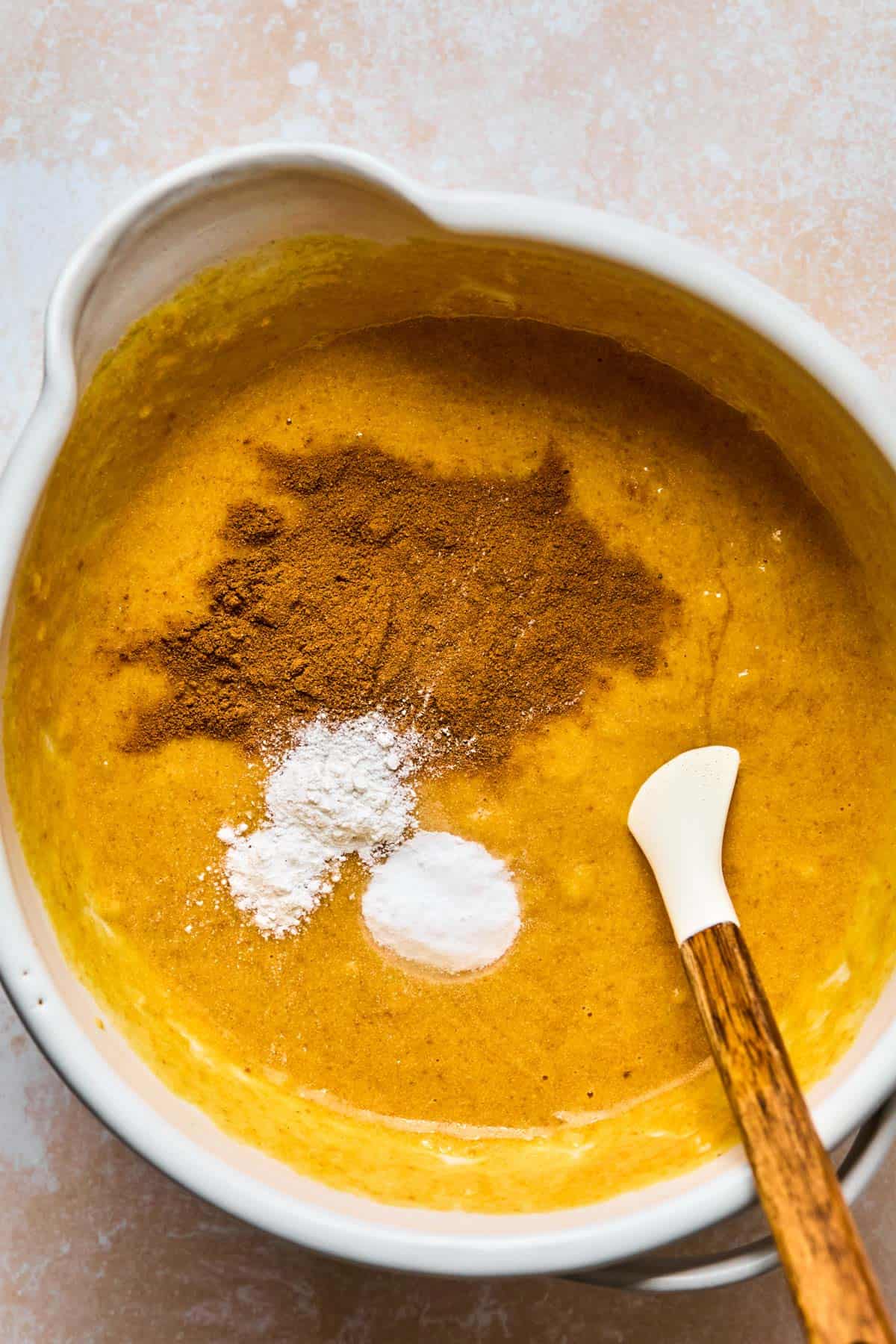 dry ingredients added to wet ingredients for healthy banana pumpkin bread