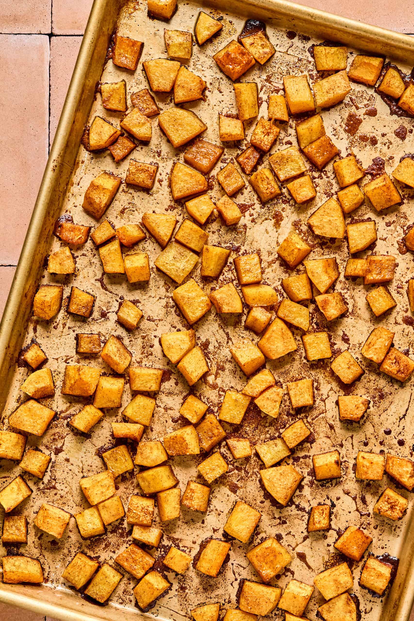 roasted butternut squash cooling on a caking sheet