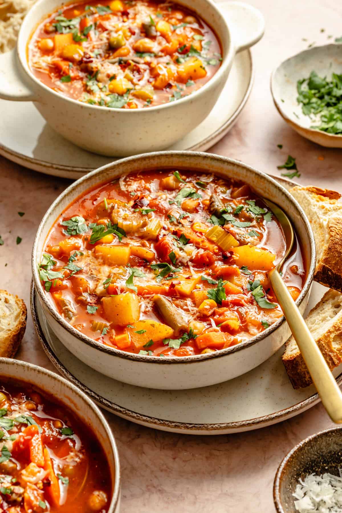 big bowl of easy vegetable soup with a large spoon dipping into it.