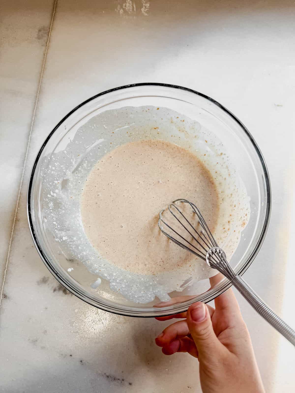 cottage cheese, maple syrup, cashew butter, and vanilla mixed in a bowl for protein cookie dough.
