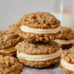 two chai oatmeal cream pies stacked with eggnog frosting.