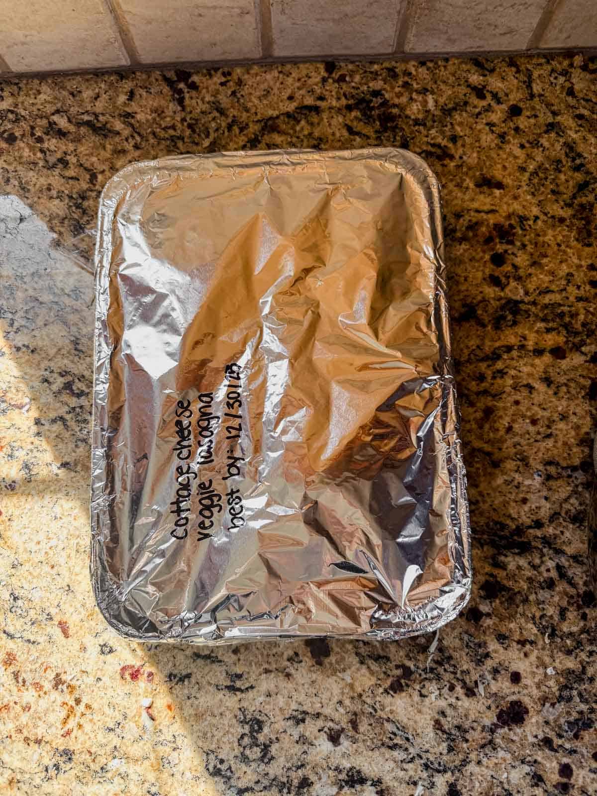 cottage cheese vegetable lasagna wrapped in foil to put in the freezer.