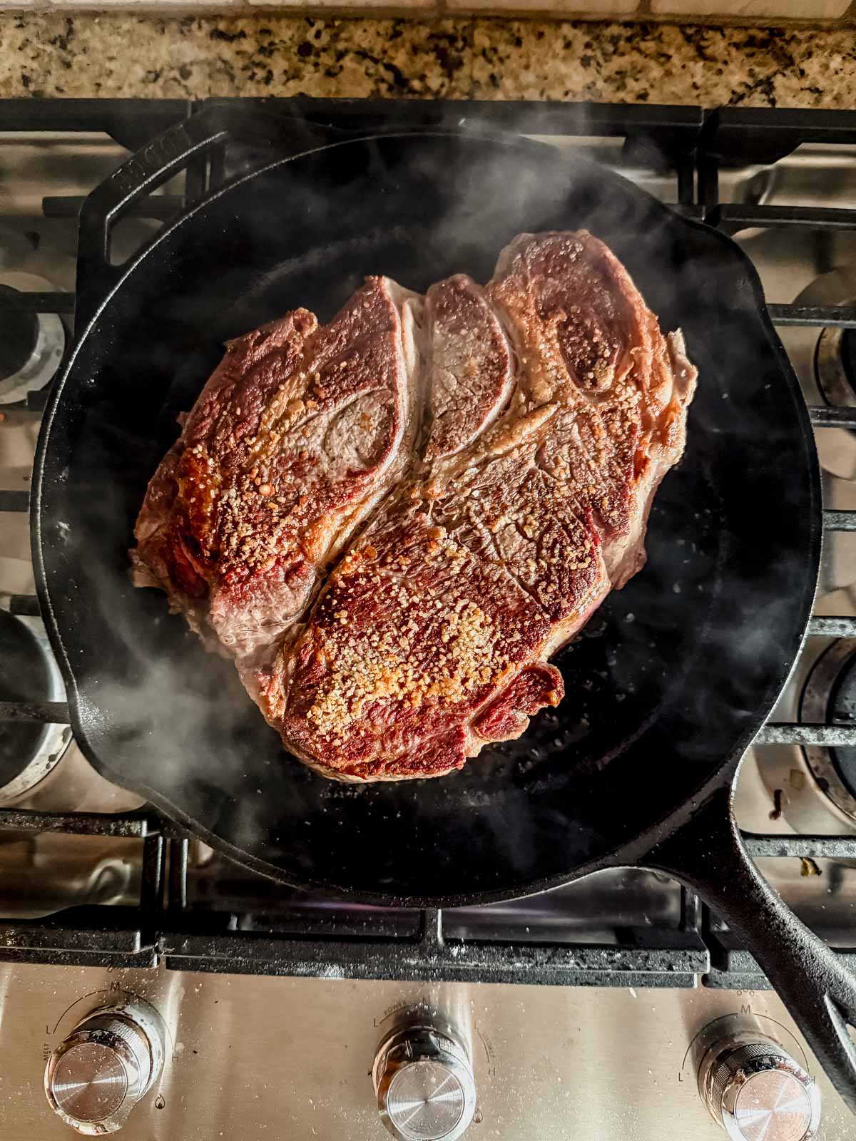 searing chuck roast until golden brown in a cast iron skillet.