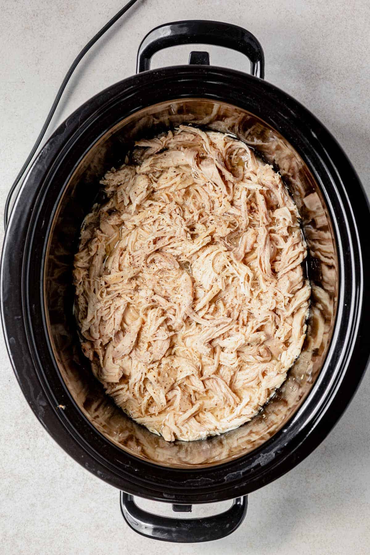 shredded chicken in the slow cooker.