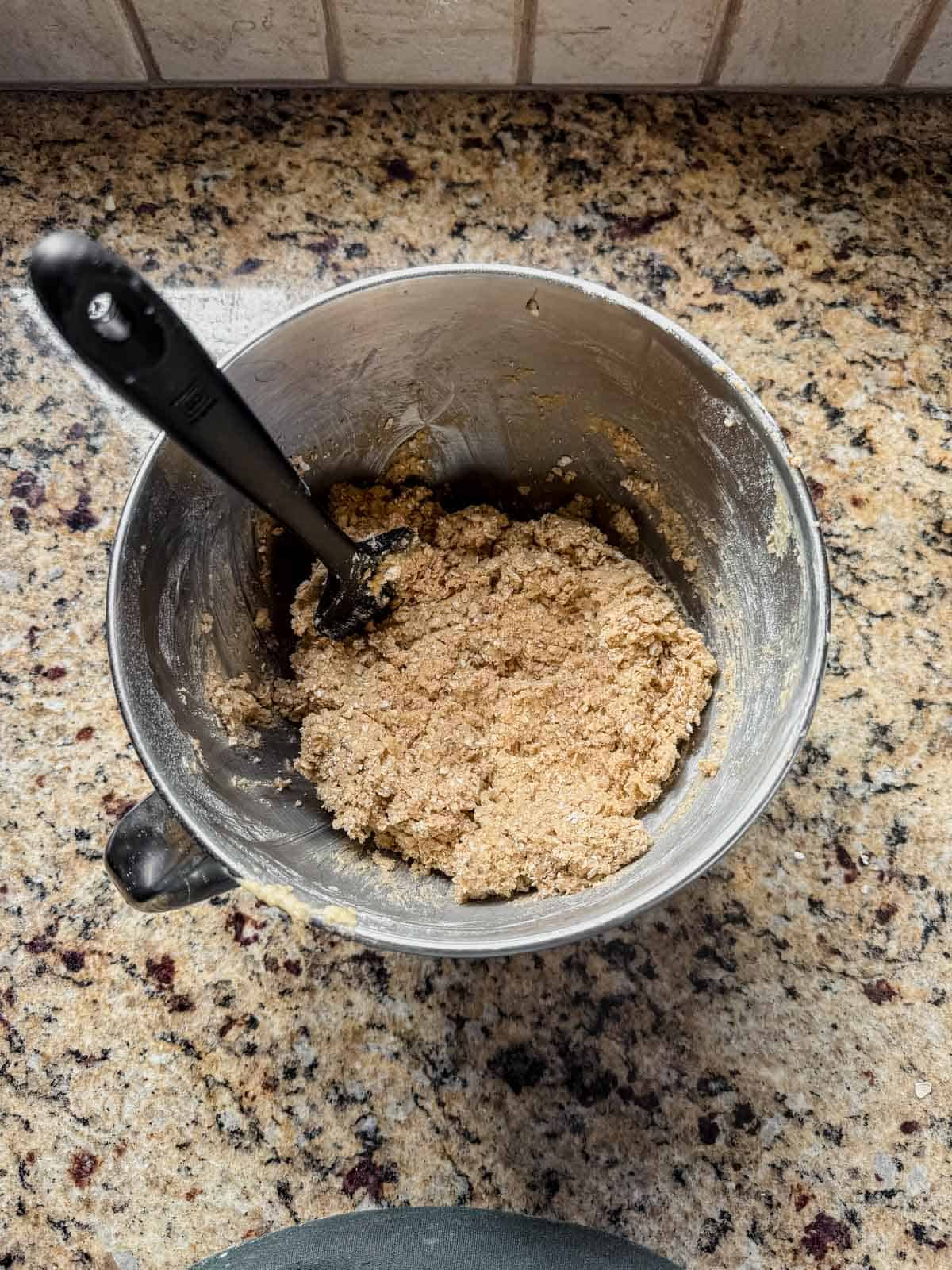 stirring quick oats into oatmeal cream pie cookies.