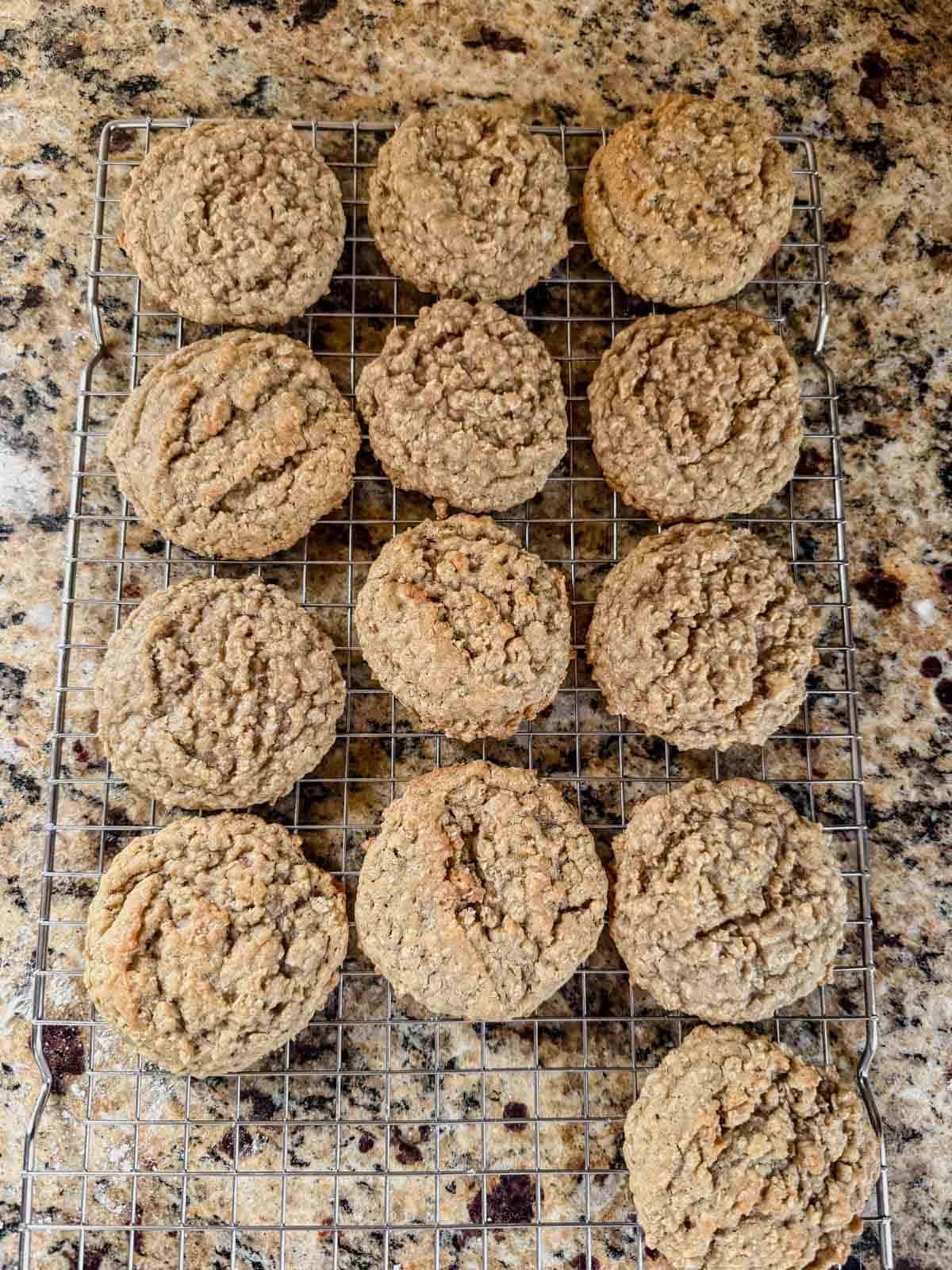 baked chai oatmeal cream pie cookies on a cooling rack.