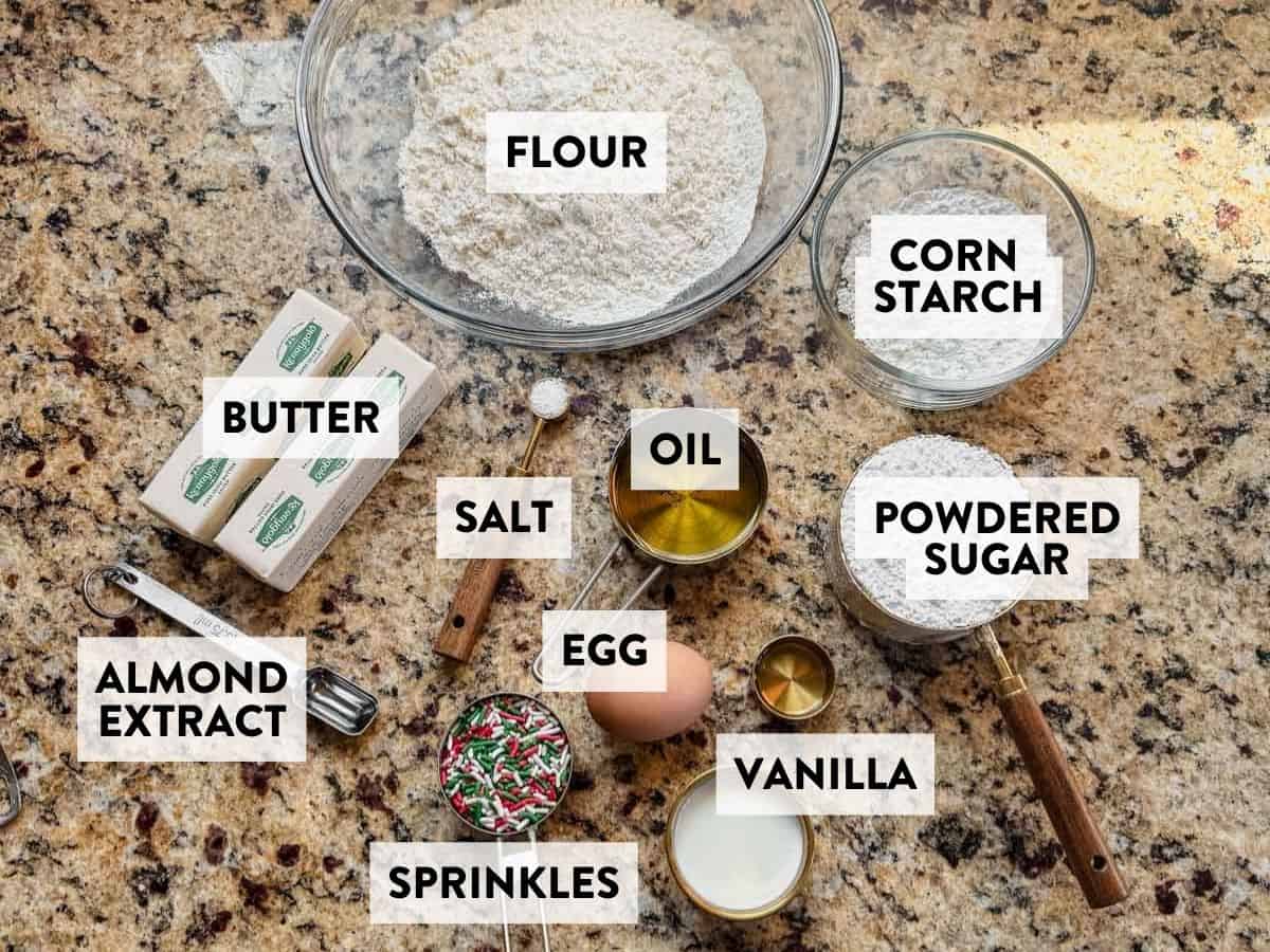 ingredients for soft christmas sugar cookies on a counter.