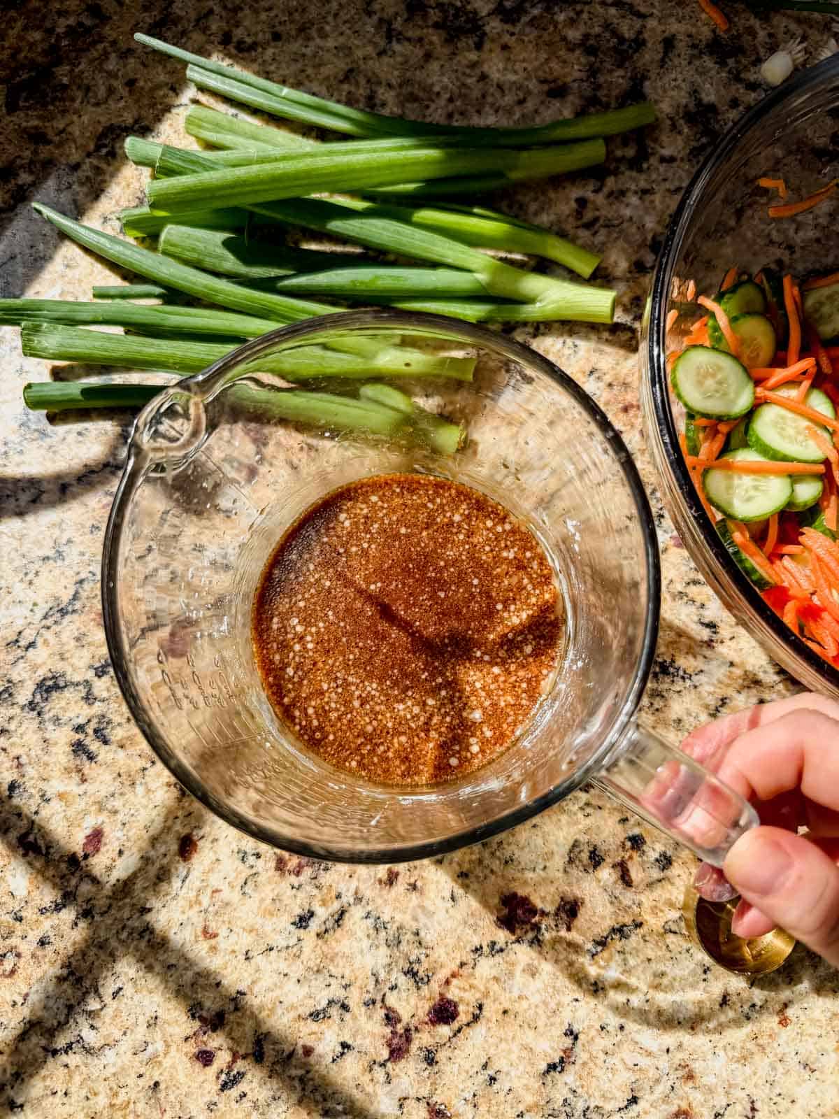 korean sauce whisked together in a measuring cup.