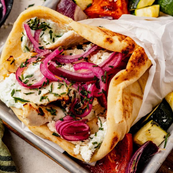 chicken doner kebab layered in a pita with tzatziki and pickled onion.
