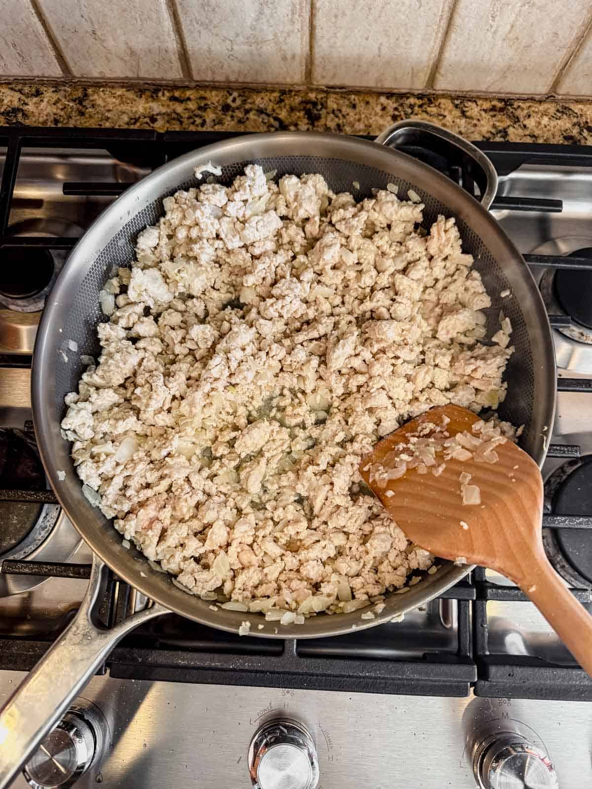 cooked ground chicken in a skillet.